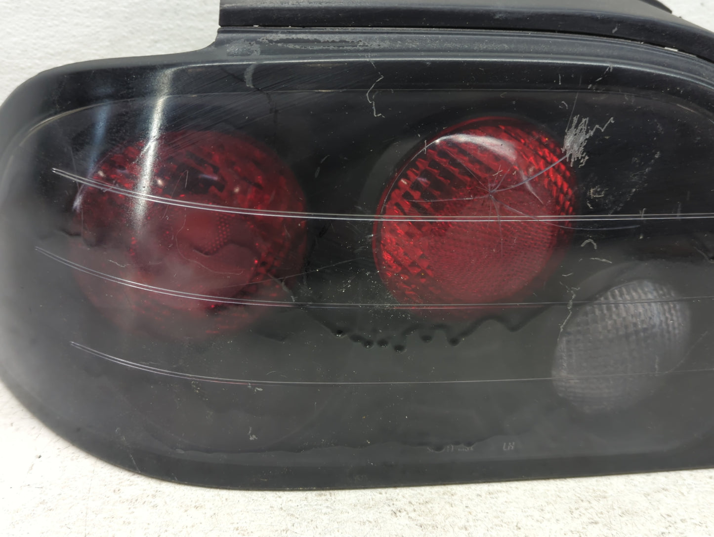 1994-1995 Ford Mustang Tail Light Assembly Driver Left OEM Fits Fits 1994 1995 OEM Used Auto Parts - Oemusedautoparts1.com
