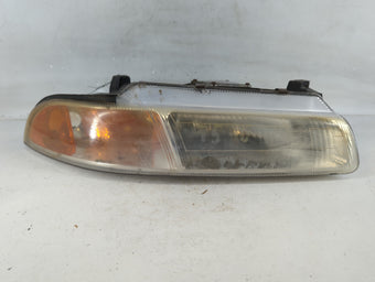 compare product 1995-1996 Chrysler Cirrus Passenger Right Oem Head Light Headlight Lamp