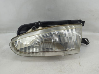 compare product 1994-1995 Hyundai Elantra Passenger Right Oem Head Light Headlight Lamp