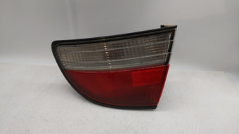 compare product 1997-1998 Mitsubishi Galant Tail Light Assembly Passenger Right OEM Fits Fits 1997 1998 OEM Used Auto Parts