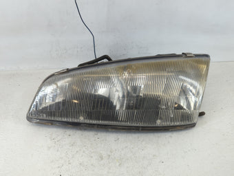 compare product 1992-1995 Pontiac Grand Am Driver Left Oem Head Light Headlight Lamp