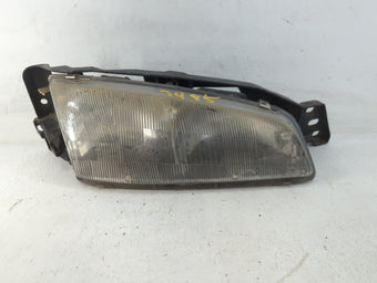compare product 1992-1995 Pontiac Grand Am Passenger Right Oem Head Light Headlight Lamp