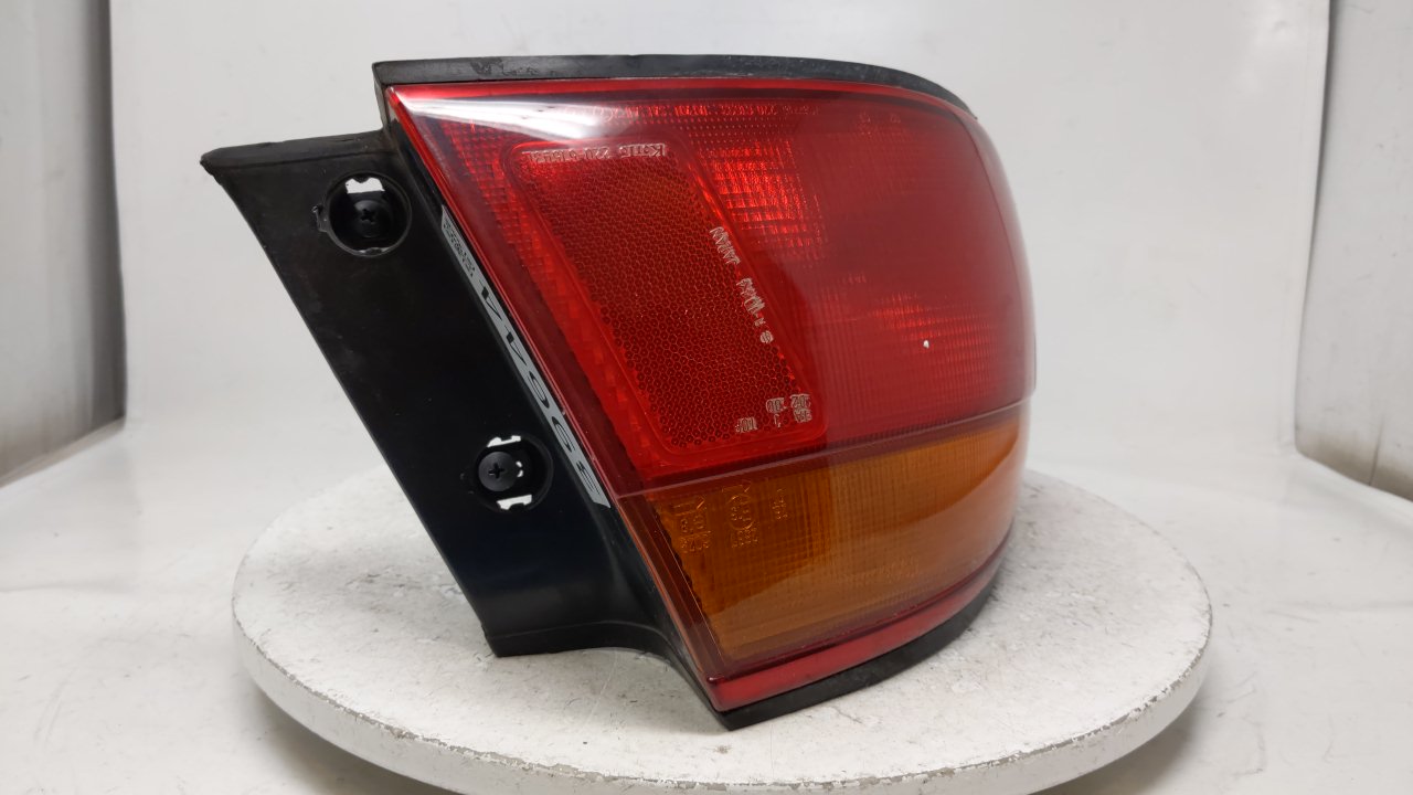 1996-1998 Mazda Millenia Tail Light Assembly Driver Left OEM Fits Fits 1996 1997 1998 OEM Used Auto Parts - Oemusedautoparts