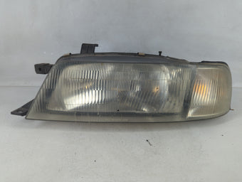 compare product 1995-2002 Suzuki Esteem Tail Light Assembly Driver Left OEM P/N:100-32020 Fits Fits 1995 1996 1997 1998 1999 2000 2001 2002 OEM Used Auto Parts