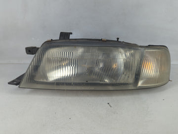 1995-2002 Suzuki Esteem Tail Light Assembly Driver Left OEM P/N:100-32020 Fits Fits 1995 1996 1997 1998 1999 2000 2001 2002 