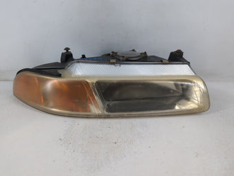 compare product 1997-2000 Chrysler Cirrus Passenger Right Oem Head Light Headlight Lamp