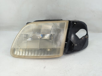 compare product 1997-1997 Ford F-150 Driver Left Oem Head Light Headlight Lamp