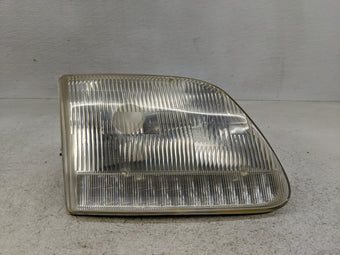 compare product 1997-2003 Ford F-150 Passenger Right Oem Head Light Headlight Lamp
