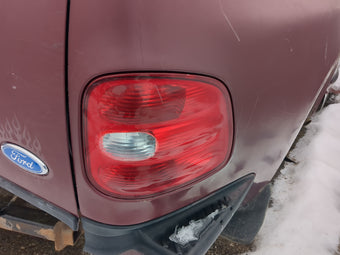 compare product 1997-1999 Ford F-150 Tail Light Assembly Passenger Right OEM Fits Fits 1997 1998 1999 OEM Used Auto Parts