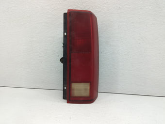 compare product 1997 Gmc Astro Tail Light Assembly Passenger Right OEM P/N:16502448 Fits OEM Used Auto Parts