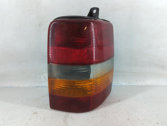 compare product 1993-1998 Jeep Grand Cherokee Tail Light Assembly Passenger Right OEM P/N:55054512 Fits Fits 1993 1994 1995 1996 1997 1998 OEM Used Auto Parts