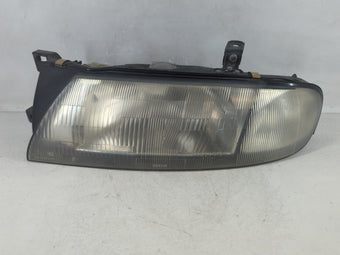 compare product 1993-1997 Nissan Altima Driver Left Oem Head Light Headlight Lamp