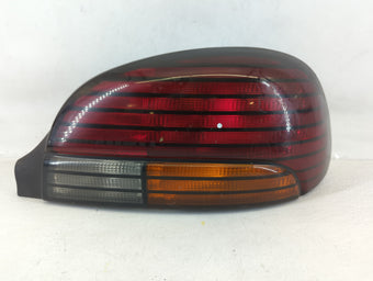compare product 1996-1998 Pontiac Grand Am Tail Light Assembly Passenger Right OEM P/N:GM 16522028 Fits Fits 1996 1997 1998 OEM Used Auto Parts