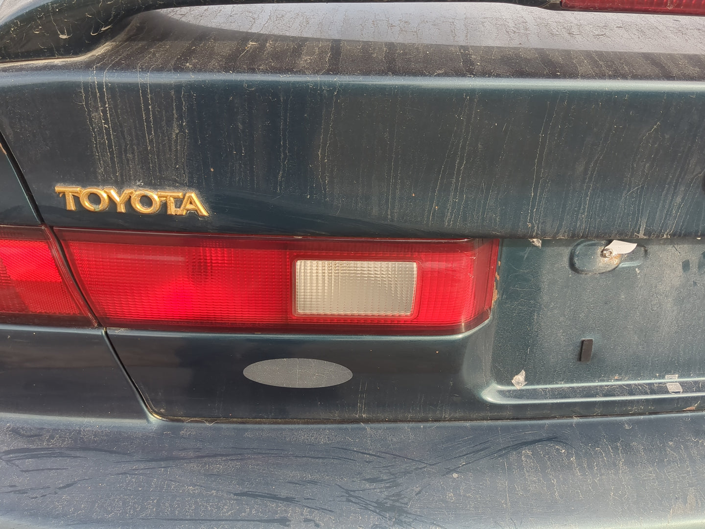 1997-1999 Toyota Camry Driver Left Side Deck Lid Mounted Tail Light - Oemusedautoparts1.com