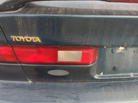 1997-1999 Toyota Camry Driver Left Side Deck Lid Mounted Tail Light - Oemusedautoparts1.com