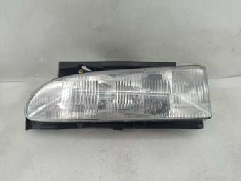 compare product 1994-1997 Toyota Corolla Driver Left Oem Head Light Headlight Lamp