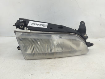 compare product 1994-1997 Toyota Corolla Passenger Right Oem Head Light Headlight Lamp 1390939