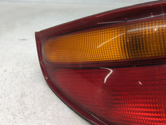 compare product 1995-2000 Dodge Stratus Tail Light Assembly Passenger Right OEM Fits Fits 1995 1996 1997 1998 1999 2000 OEM Used Auto Parts