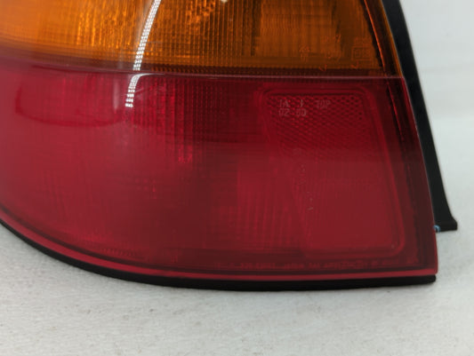 1996-1998 Mazda Millenia Tail Light Assembly Driver Left OEM P/N:220-61693 Fits Fits 1996 1997 1998 OEM Used Auto Parts
