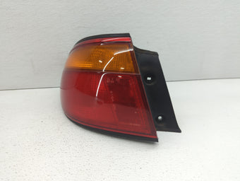 compare product 1996-1998 Mazda Millenia Tail Light Assembly Driver Left OEM P/N:220-61693 Fits Fits 1996 1997 1998 OEM Used Auto Parts