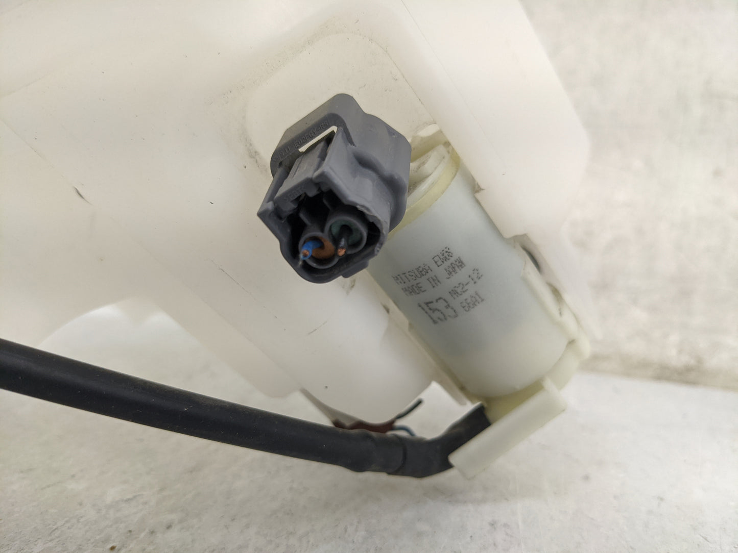 1998 Mitsubishi Lancer Windshield Washer Fluid Reservoir Bottle - Oemusedautoparts1.com