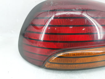 compare product 1996-1998 Pontiac Grand Am Tail Light Assembly Driver Left OEM Fits Fits 1996 1997 1998 OEM Used Auto Parts