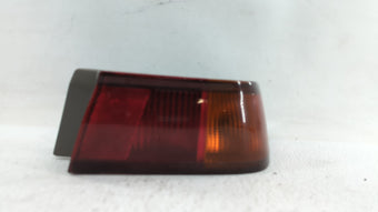 compare product 1997-1999 Toyota Camry Tail Light Assembly Passenger Right OEM P/N:81560-AA020 Fits Fits 1997 1998 1999 OEM Used Auto Parts