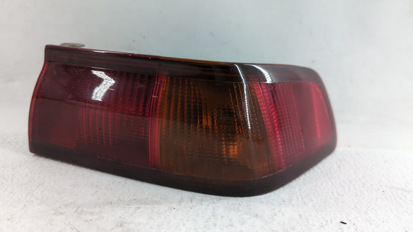 1997-1999 Toyota Camry Tail Light Assembly Passenger Right OEM P/N:81560-AA020 Fits Fits 1997 1998 1999 OEM Used Auto Parts 