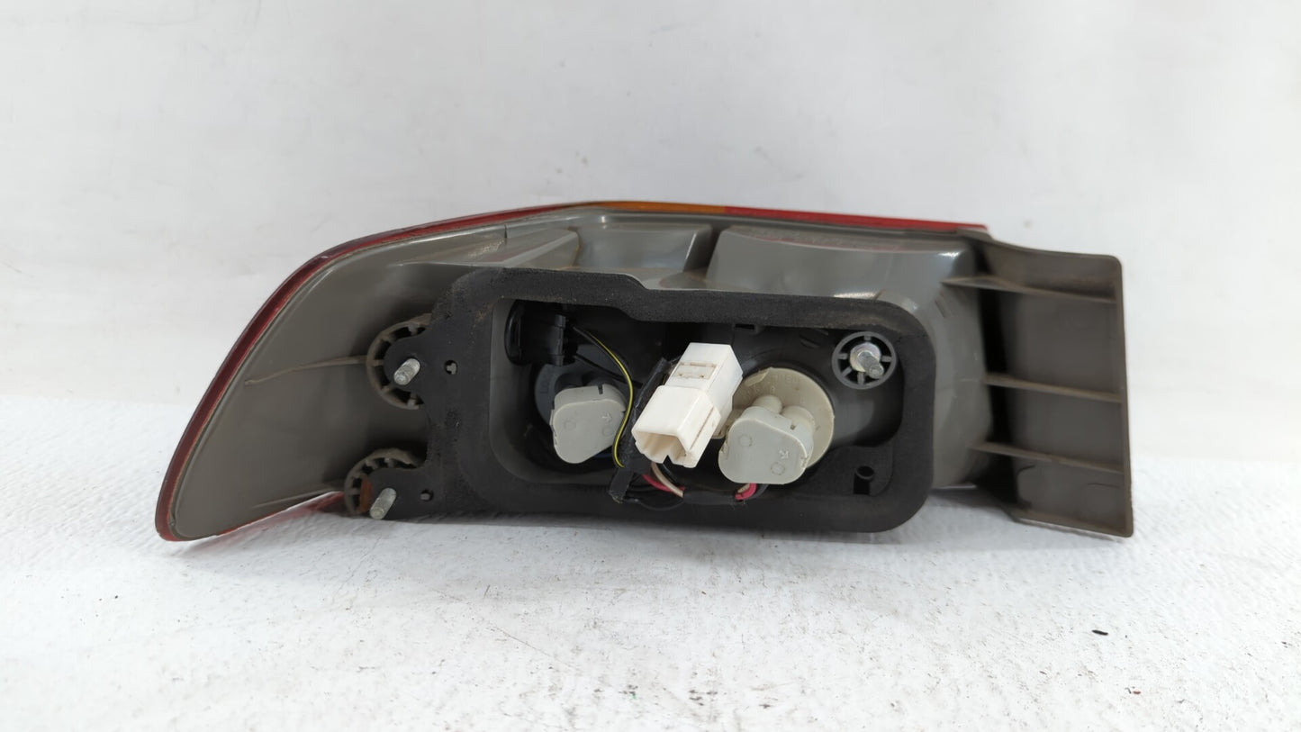 1997-1999 Toyota Camry Tail Light Assembly Passenger Right OEM P/N:81560-AA020 Fits Fits 1997 1998 1999 OEM Used Auto Parts 