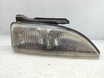 compare product 1995 Chevrolet Cavalier Passenger Right Oem Head Light Headlight Lamp