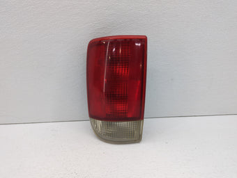 compare product 1999 Chevrolet S10 Blazer Tail Light Assembly Driver Left OEM P/N:16518499 Fits OEM Used Auto Parts