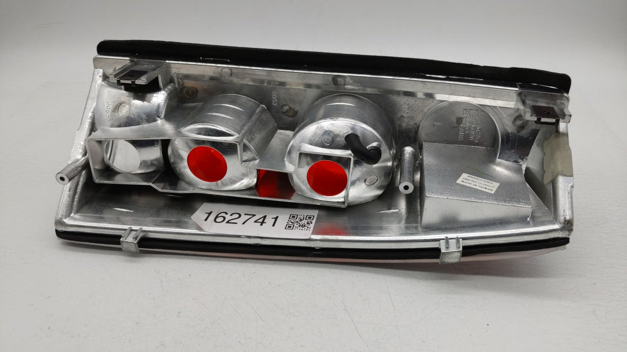 1995-1999 Chevrolet Suburban 1500 Tail Light Assembly Driver Left OEM P/N:SK3811-C-1 GM254-UURW2 Fits OEM Used Auto Parts - 