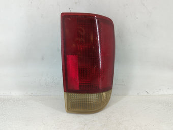 compare product 1999 Gmc Envoy Tail Light Assembly Passenger Right OEM P/N:16518500 Fits OEM Used Auto Parts