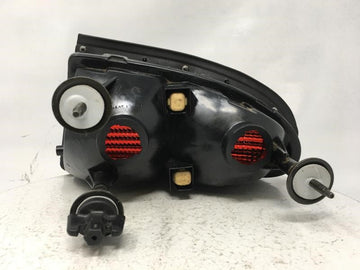 1999 Oldsmobile Aurora Tail Light Assembly Driver Left OEM P/N:QTR PNL MTD DRIVER LEFT Fits Fits 1995 1996 1997 1998 OEM Used Auto Parts