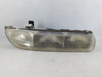 compare product 1996-1999 Saturn Sl Driver Left Oem Head Light Headlight Lamp 596156