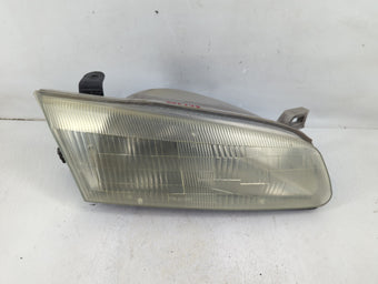 compare product 1997-1999 Toyota Camry Passenger Right Oem Head Light Headlight Lamp