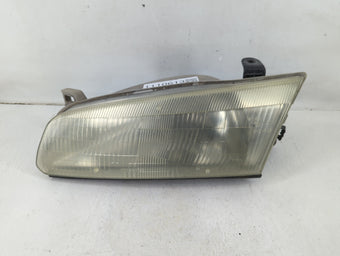 compare product 1997-1999 Toyota Camry Driver Left Oem Head Light Headlight Lamp