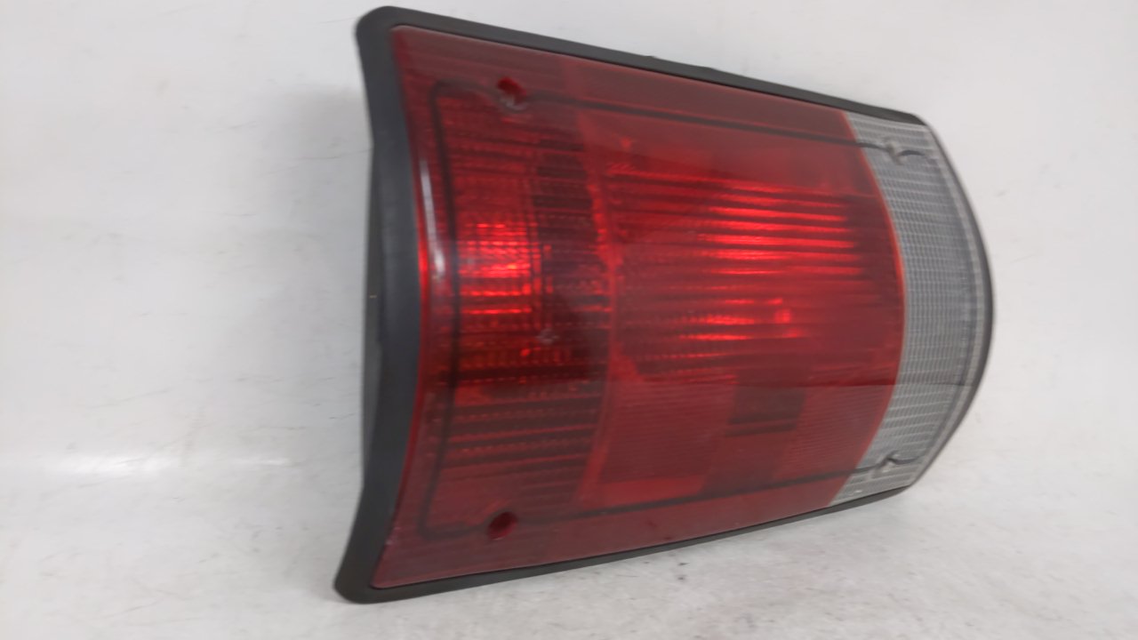 2002-2004 Ford E-150 Tail Light Assembly Driver Left OEM P/N:F7UB-13441-AA Fits Fits 2000 2001 2002 2003 2004 2005 OEM Used 