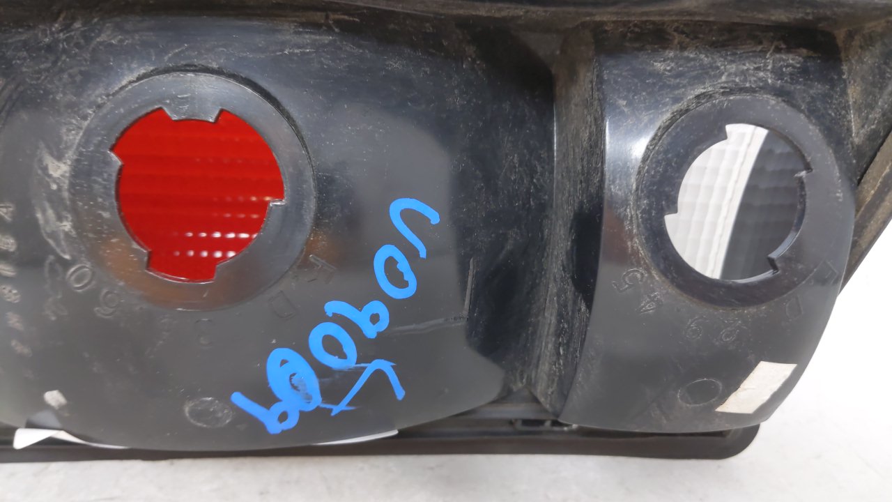 2002-2004 Ford E-150 Tail Light Assembly Driver Left OEM P/N:F7UB-13441-AA Fits Fits 2000 2001 2002 2003 2004 2005 OEM Used 