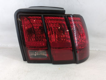 compare product 1999-2004 Ford Mustang Tail Light Assembly Passenger Right OEM P/N:XR33-13B504-B Fits Fits 1999 2000 2001 2002 2003 2004 OEM Used Auto Parts