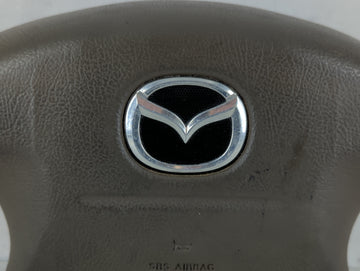 2000-2002 Mazda 626 Air Bag Driver Left Steering Wheel Mounted P/N:DBC KYN 5Z AR0 Fits Fits 2000 2001 2002 OEM Used Auto Parts