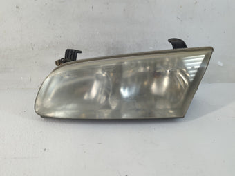compare product 2000-2001 Toyota Camry Driver Left Oem Front Light Lamp 927675