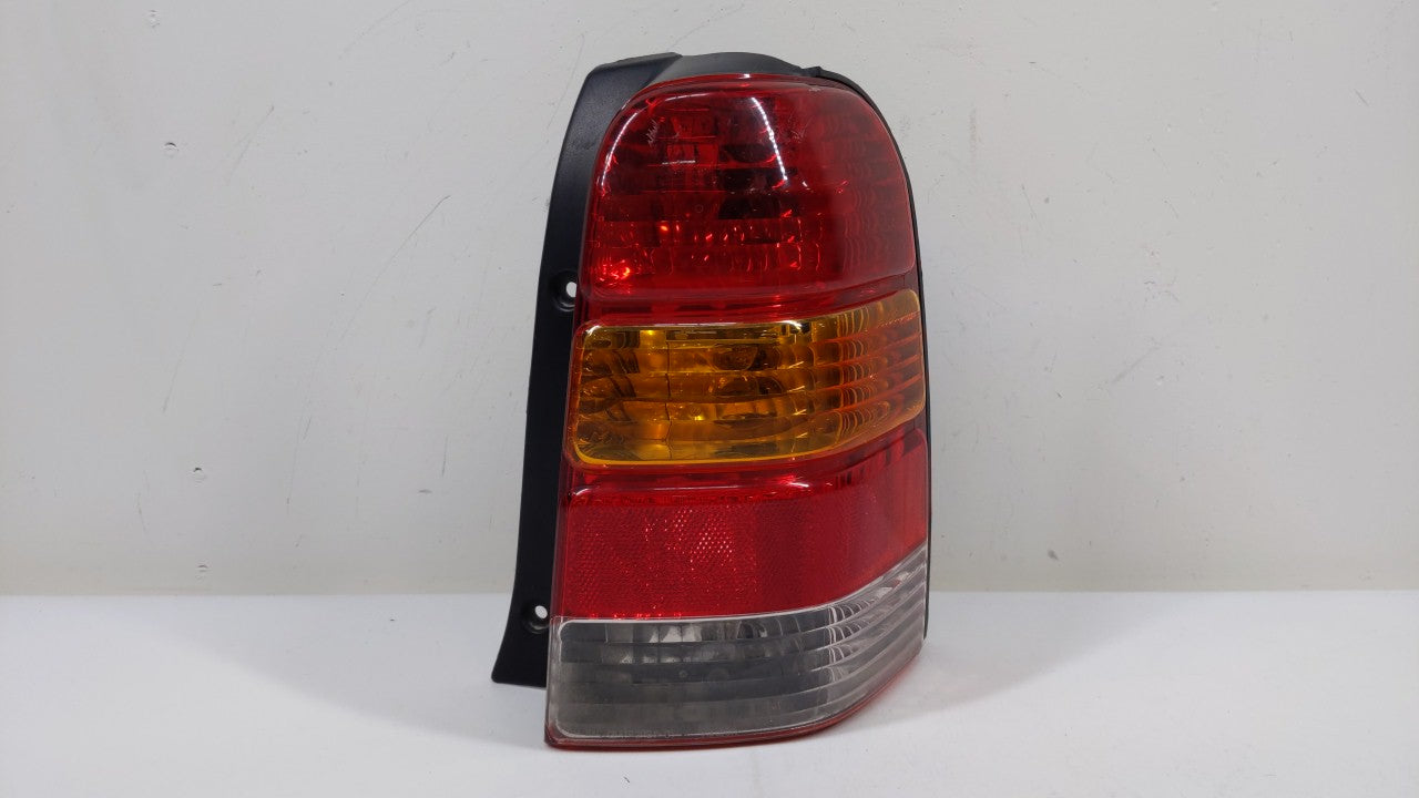 2001-2007 Ford Escape Tail Light Assembly Passenger Right OEM P/N:1L84-13B504-D 4L84-13B504-D Fits OEM Used Auto Parts - Oem