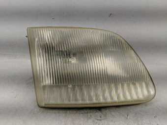 compare product 1997-2003 Ford F-150 Passenger Right Oem Head Light Headlight Lamp