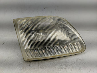 compare product 1997-2003 Ford F-150 Passenger Right Oem Head Light Headlight Lamp