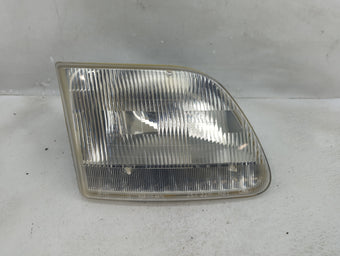 compare product 1997-2003 Ford F-150 Passenger Right Oem Head Light Headlight Lamp