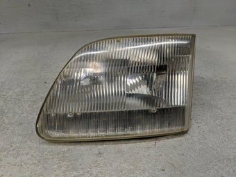 compare product 1997-2003 Ford F-150 Driver Left Oem Head Light Headlight Lamp