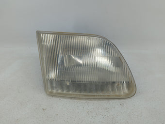 compare product 1997-2003 Ford F-150 Passenger Right Oem Head Light Headlight Lamp 363391