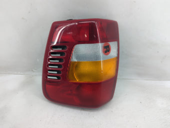 compare product 1999-2002 Jeep Grand Cherokee Tail Light Assembly Passenger Right OEM P/N:55155138 Fits Fits 1999 2000 2001 2002 OEM Used Auto Parts
