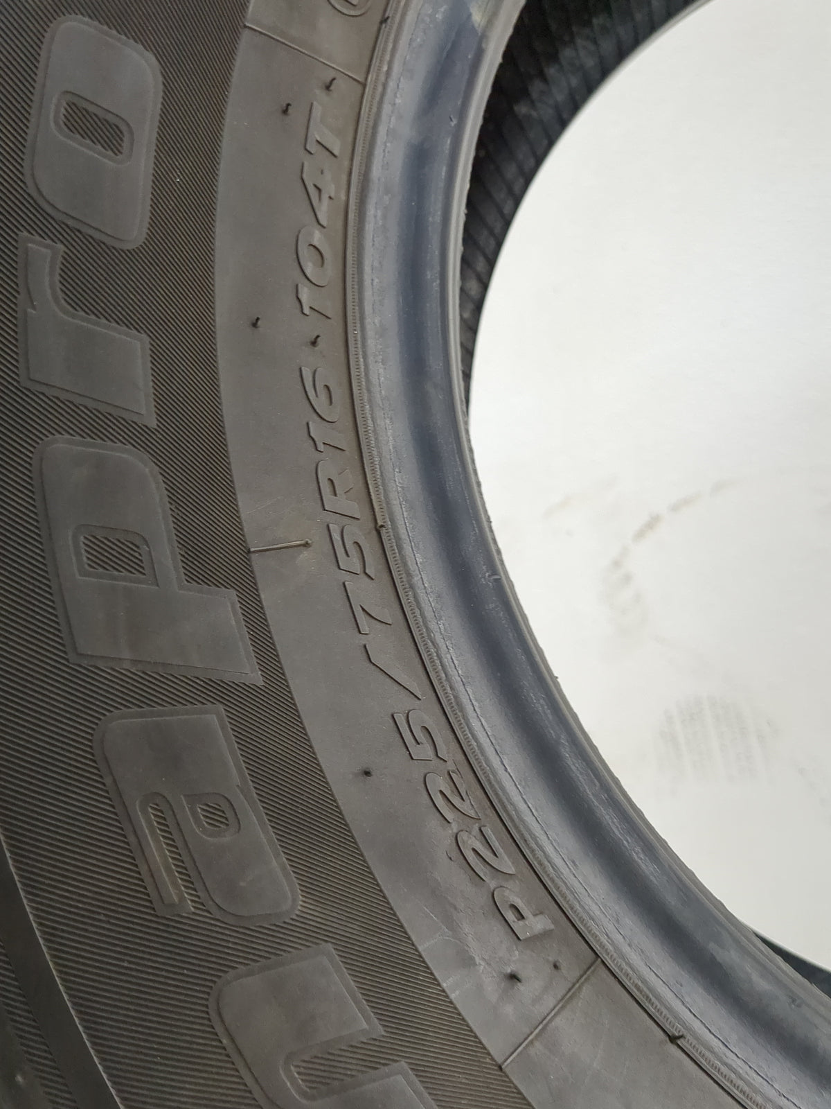 Used Tire P225/75R16 HANKOOK DYNAPRO HT 104T - Tread Depth 9.5/32 - Oemusedautoparts1.com